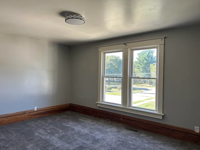 an empty room with window