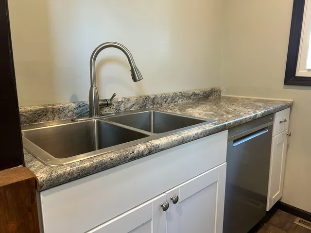 a close view of a sink and tap