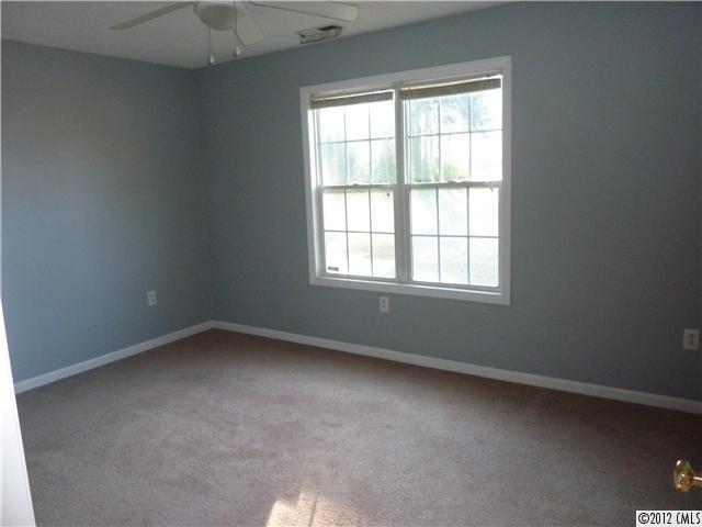 1105 Crescent Way Wingate, NC 28174 - Photo 5 of 11 an empty room with a window