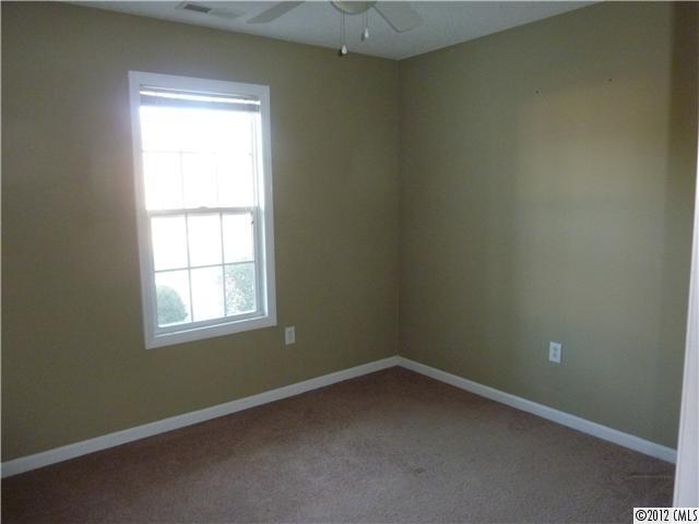 1105 Crescent Way Wingate, NC 28174 - Photo 7 of 11 an empty room with a window