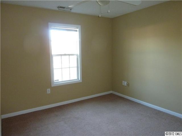 1105 Crescent Way Wingate, NC 28174 - Photo 8 of 11 an empty room with a window