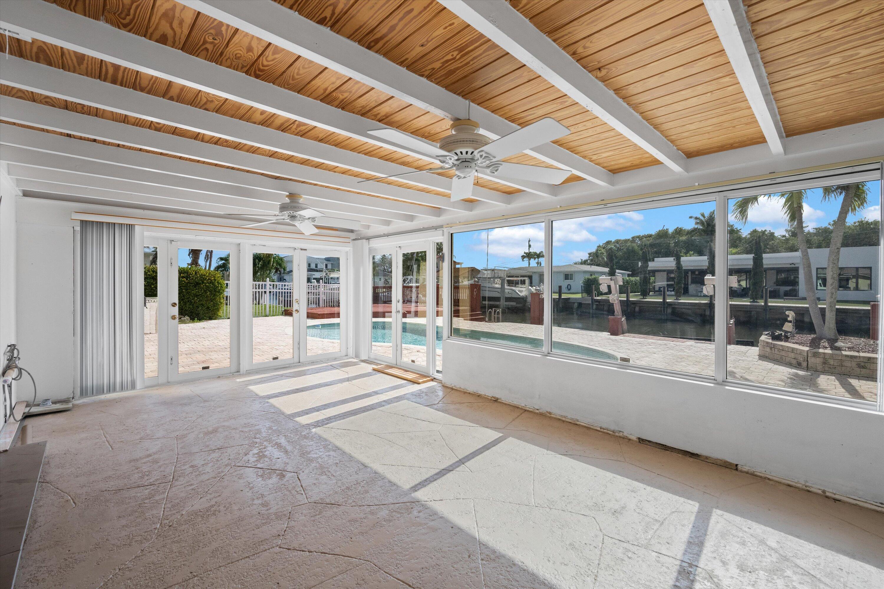 161 Neptune Drive Hypoluxo, FL 33462 - Photo 7 of 31 161 Neptune sunroom2