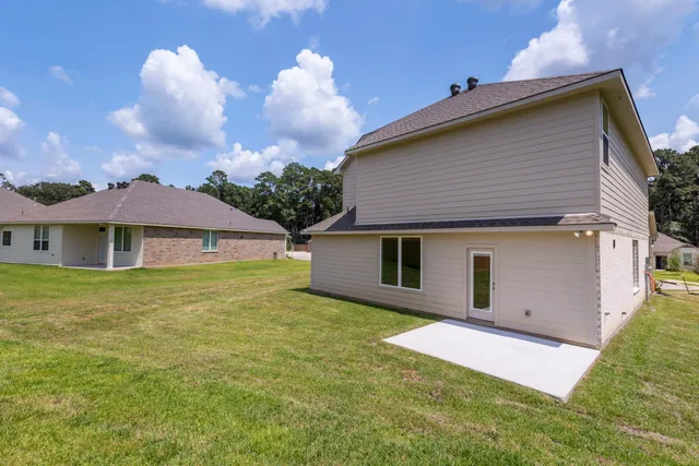 a front view of a house with yard