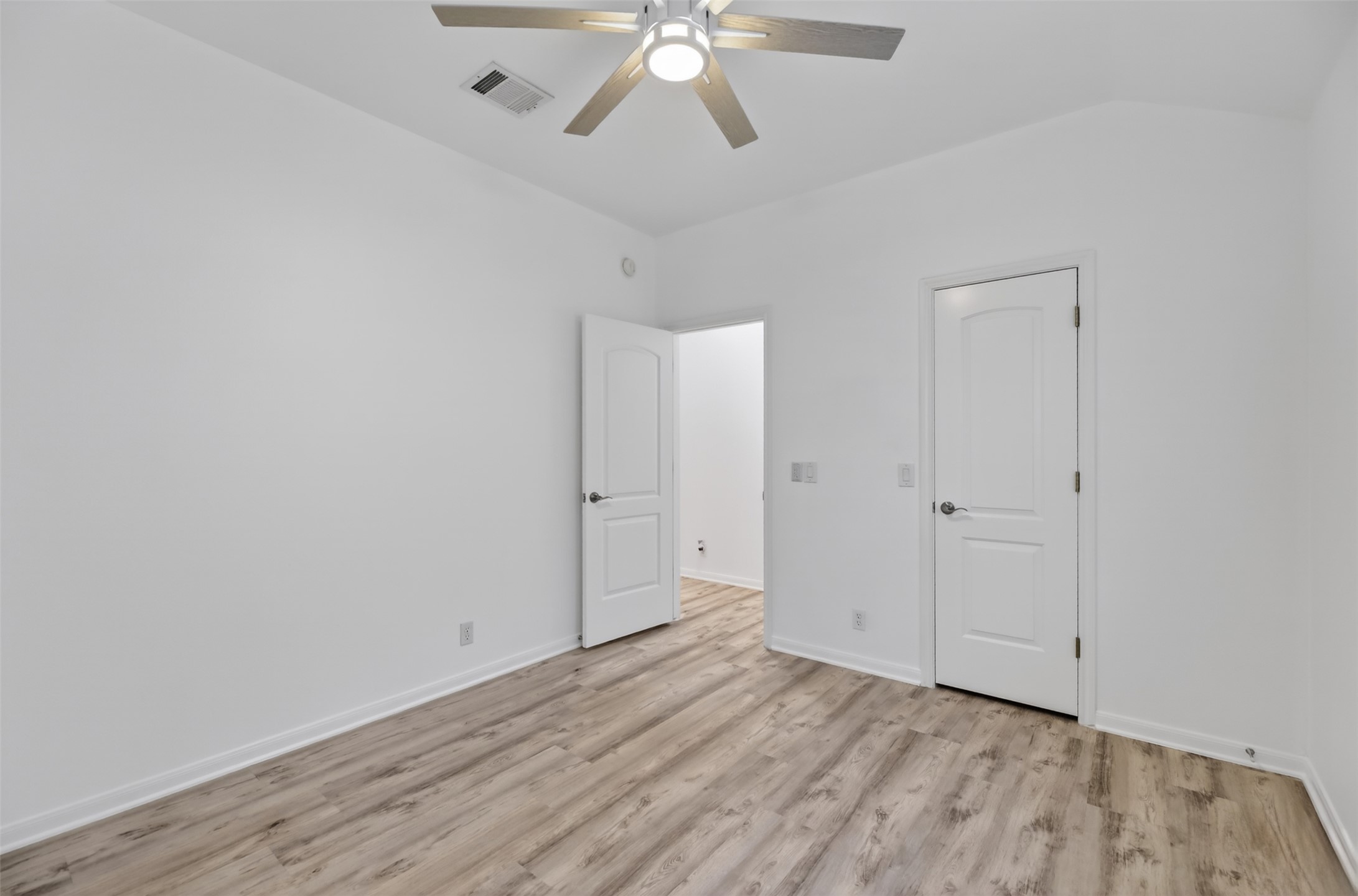545 Manchester Lane Austin, TX 78737 - Photo 19 of 30 wooden floor in an empty room