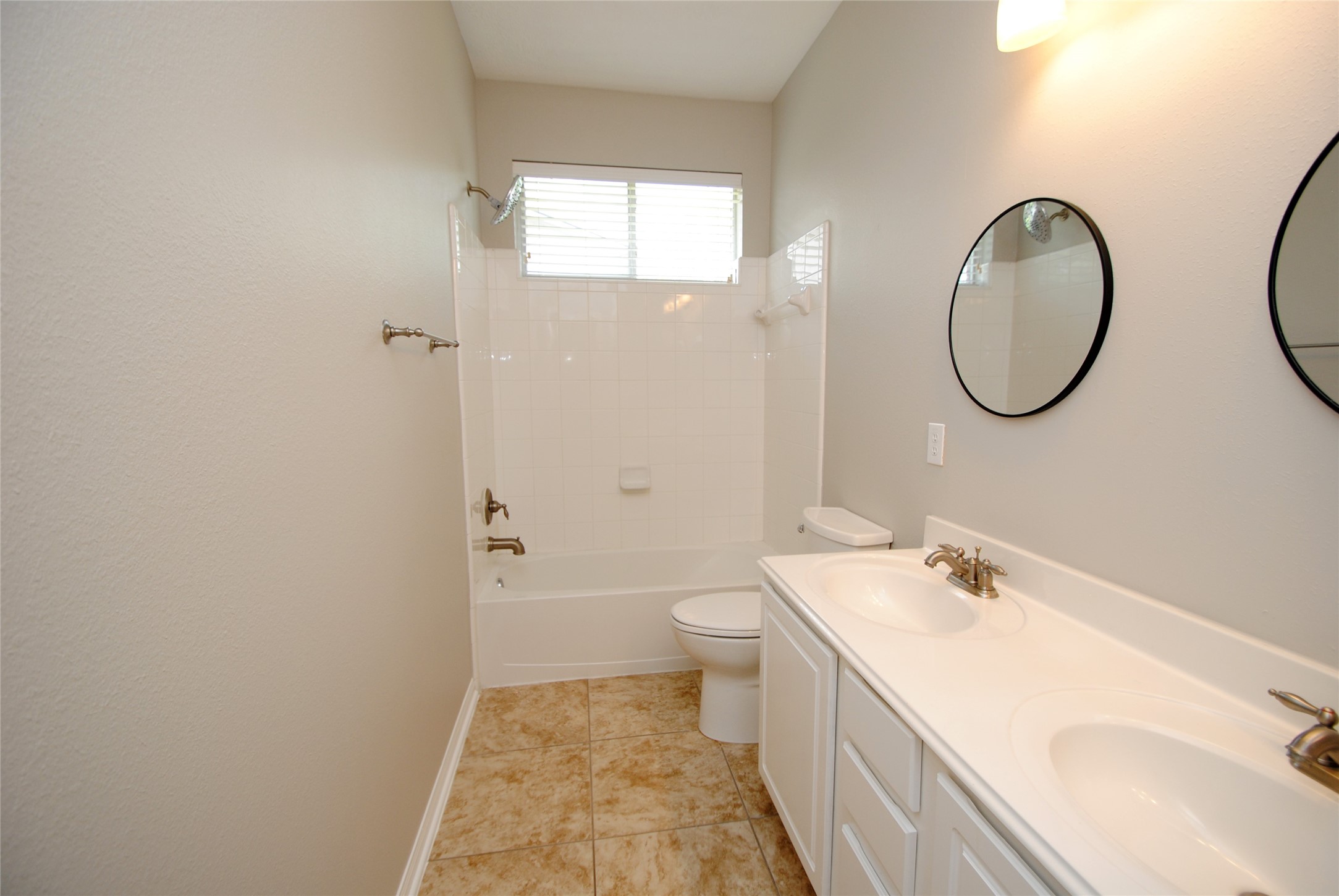 13409 Garden Spring Court Rosharon, TX 77583 - Photo 25 of 38 a bathroom with a sink and a mirror