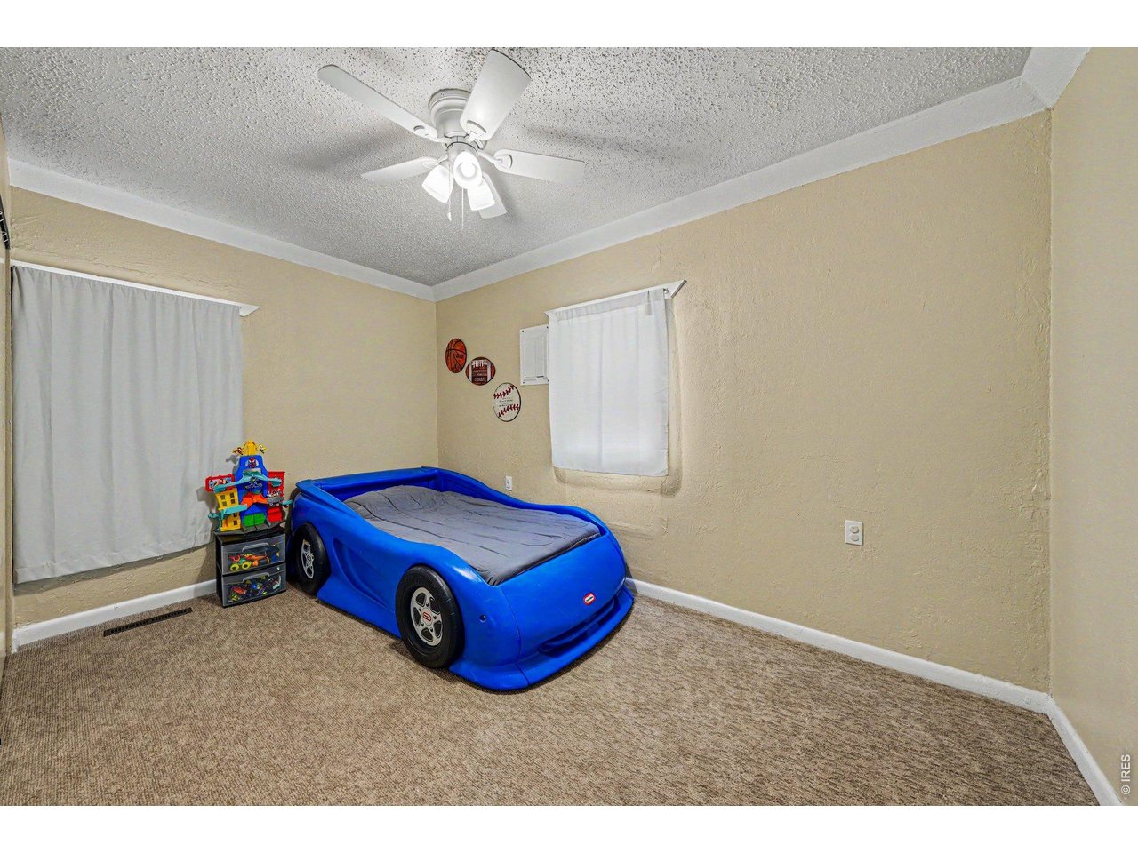 1430 30th Street Road Greeley, CO 80631 - Photo 15 of 22 a car parked in a room