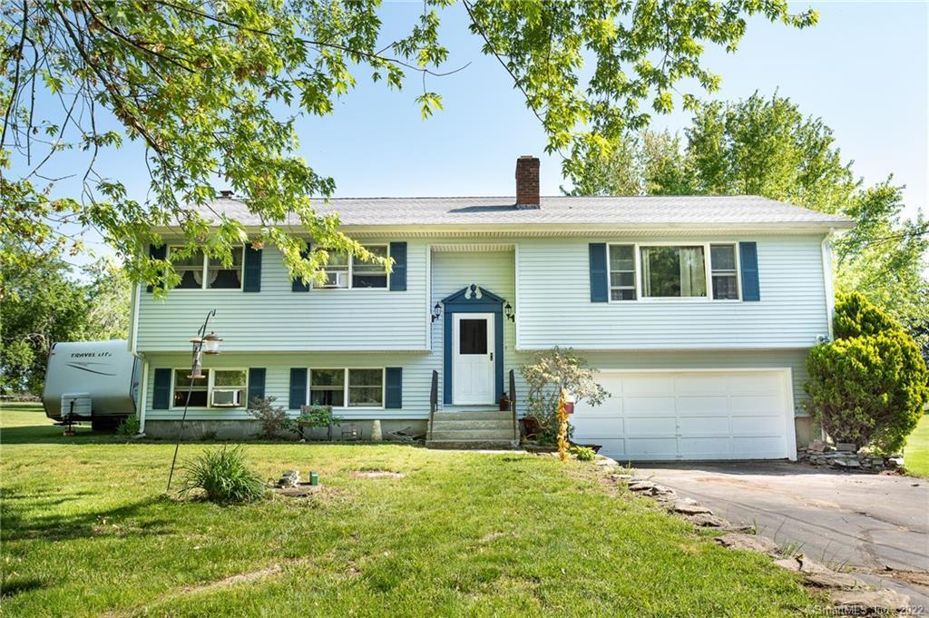 14 Burdick Road Preston, CT 06365 - Photo 1 of 1 a front view of a house with a yard