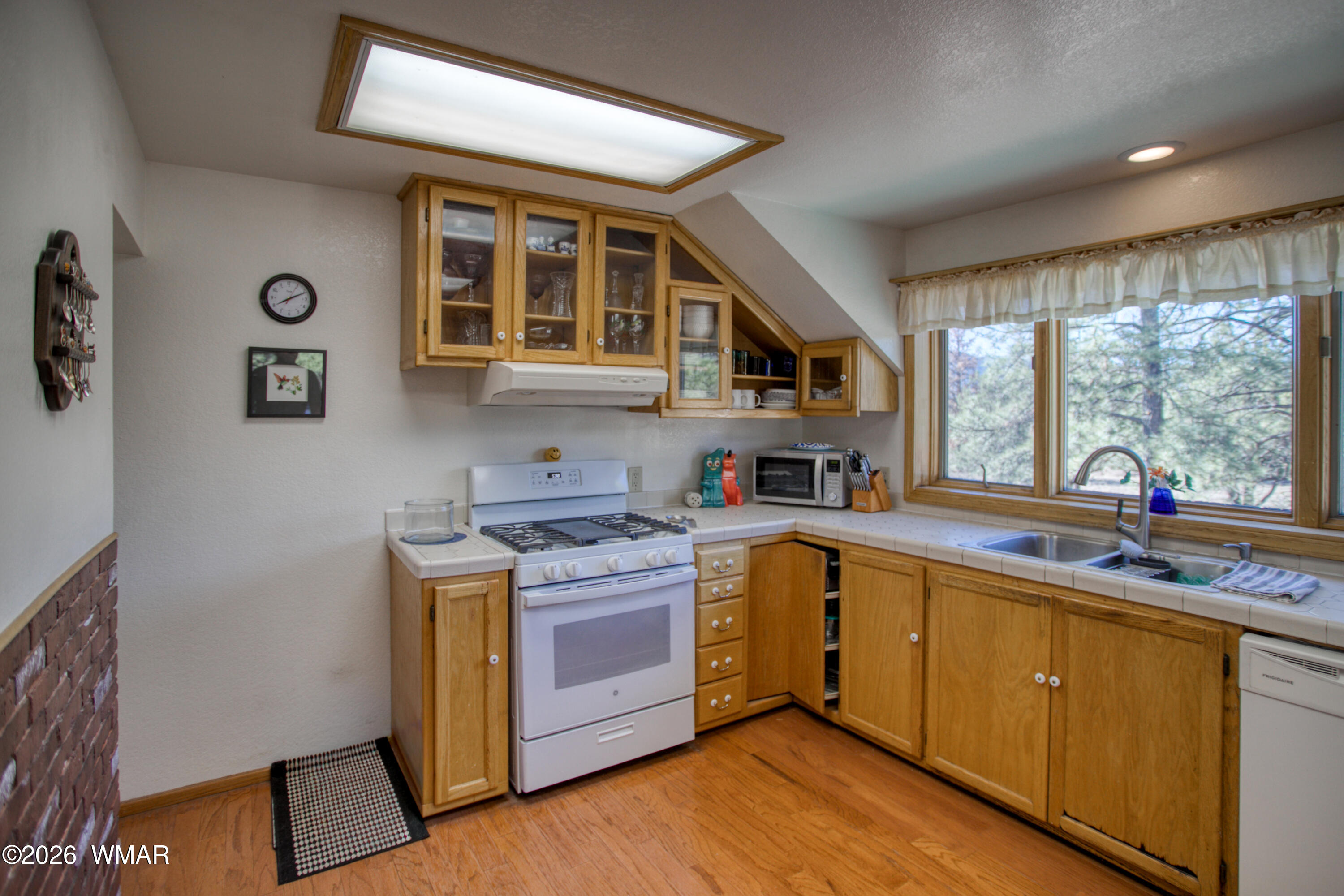19 County Road Show Low, AZ 85901 - Photo 10 of 43 a kitchen with a sink cabinets and window