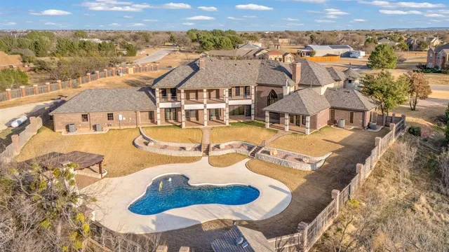 a view of a house with a swimming pool