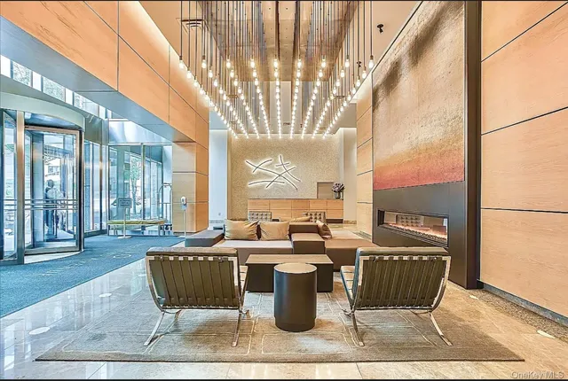 a living room with large windows