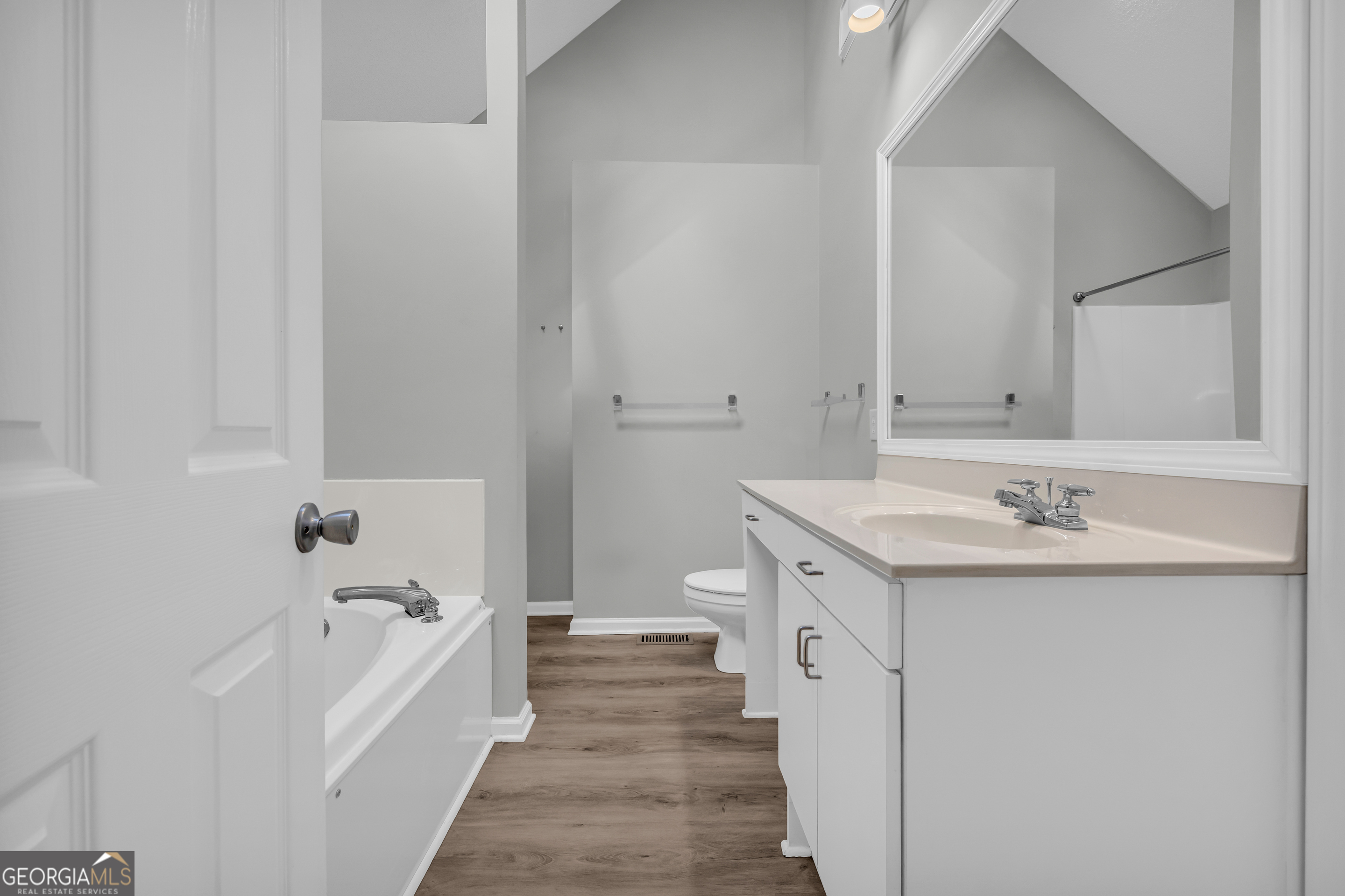 222 Blue Ridge Drive Sautee Nacoochee, GA 30571 - Photo 23 of 106 a spacious bathroom with a granite countertop sink and a bathtub