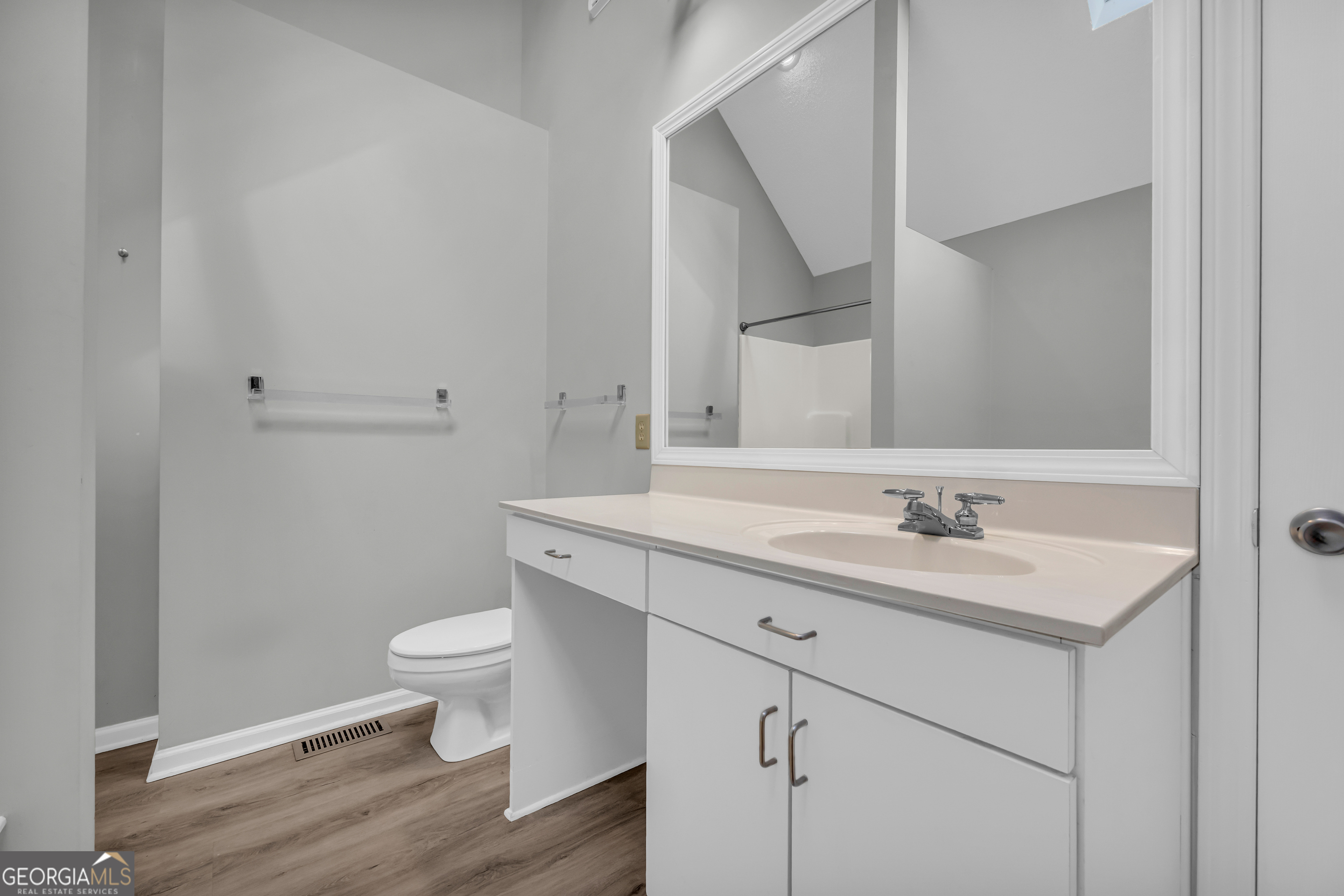 222 Blue Ridge Drive Sautee Nacoochee, GA 30571 - Photo 24 of 106 a bathroom with a toilet a sink and mirror