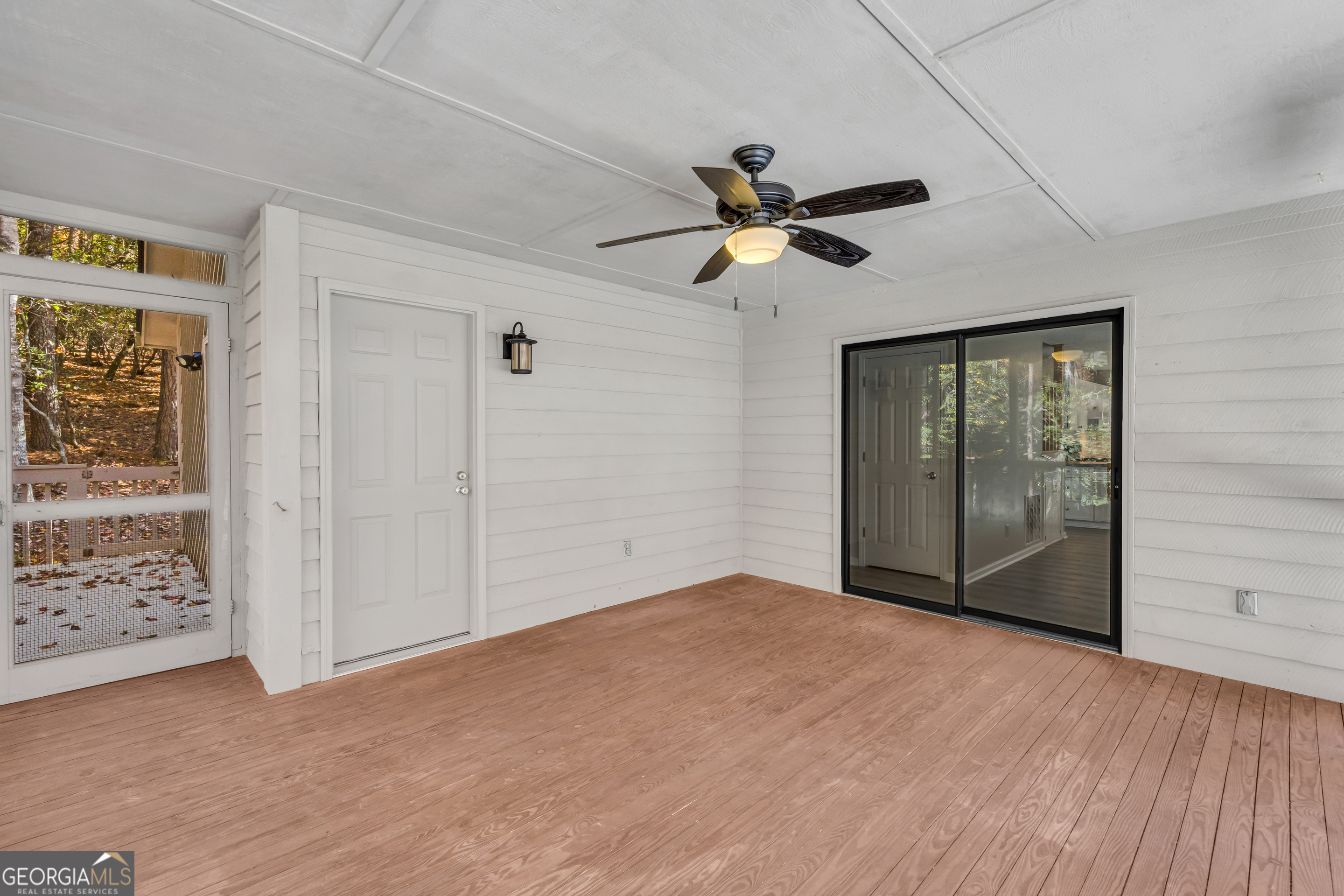 222 Blue Ridge Drive Sautee Nacoochee, GA 30571 - Photo 30 of 106 a view of empty room with wooden floor and fan