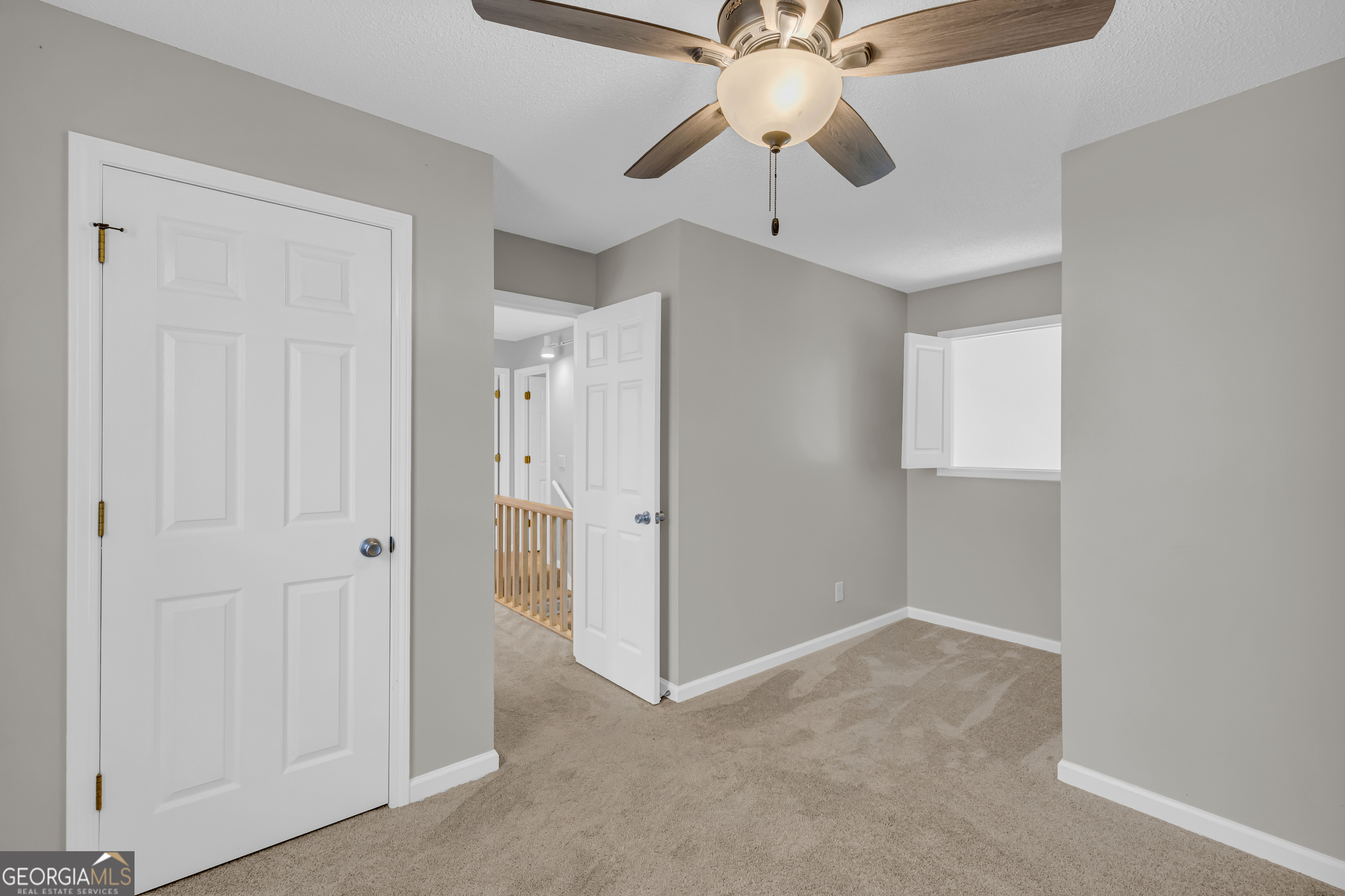 222 Blue Ridge Drive Sautee Nacoochee, GA 30571 - Photo 38 of 106 wooden floor in an empty room with a chandelier fan