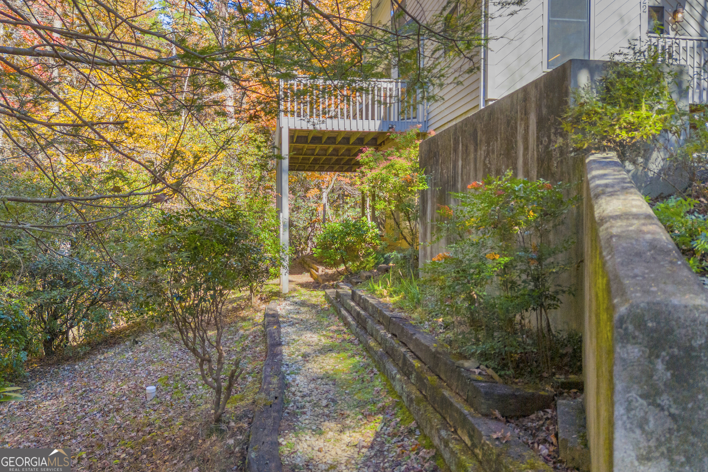 222 Blue Ridge Drive Sautee Nacoochee, GA 30571 - Photo 49 of 106 a backyard of a house with lots of green space