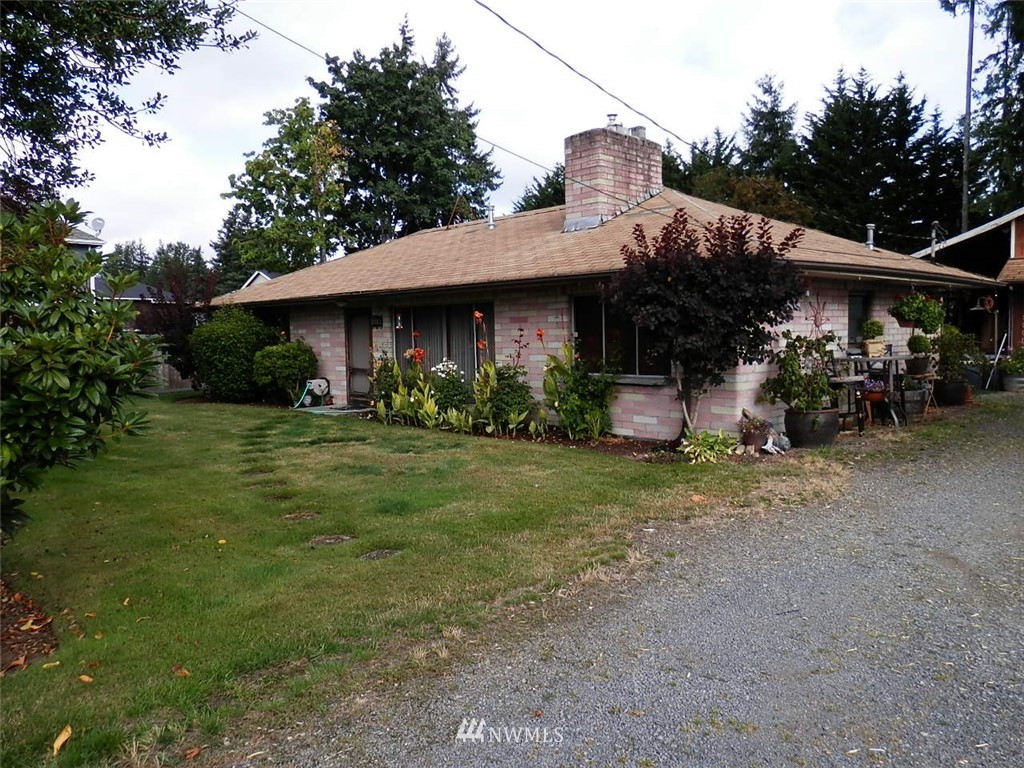 4000 Northeast 24th Street Renton, WA 98056 - Photo 1 of 1 a front view of a house with garden