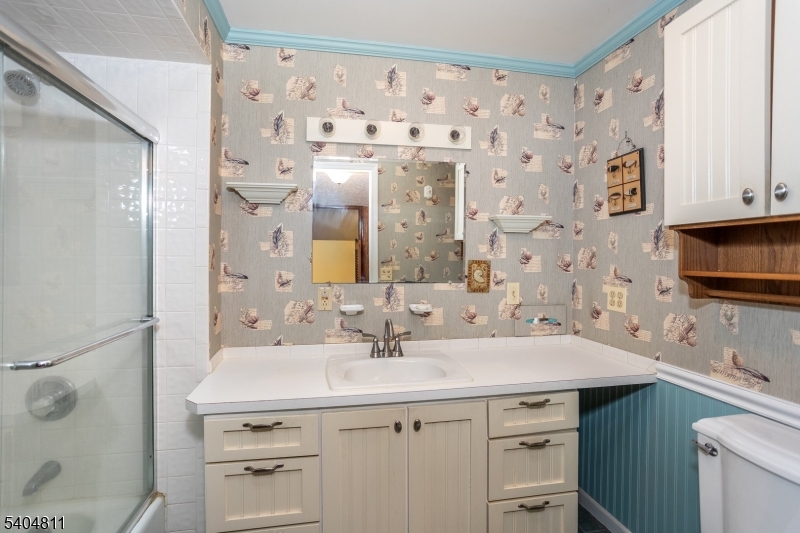 100 Troy Hills Road Whippany, NJ 07981 - Photo 18 of 37 a bathroom with a sink and a mirror