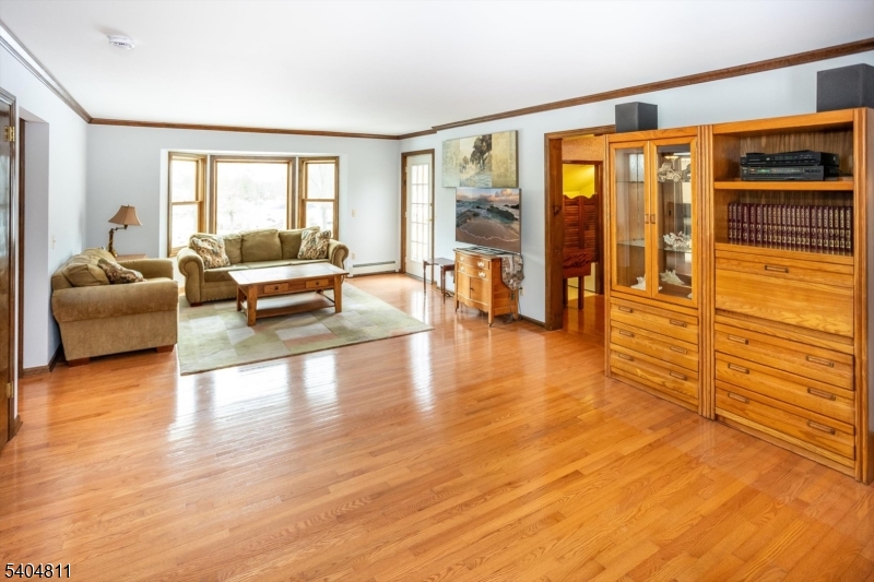 100 Troy Hills Road Whippany, NJ 07981 - Photo 19 of 37 a living room with furniture and wooden floor