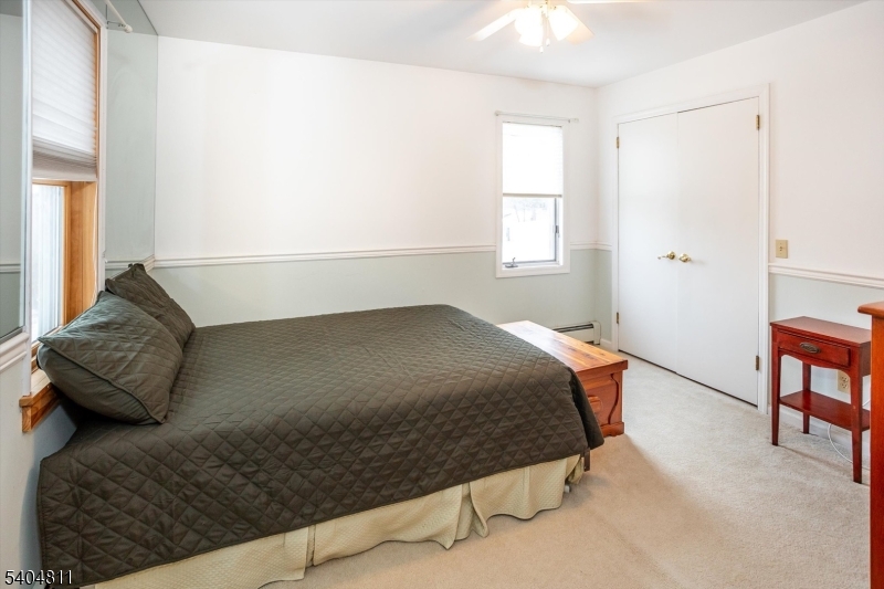 100 Troy Hills Road Whippany, NJ 07981 - Photo 25 of 37 a bedroom with a bed and window