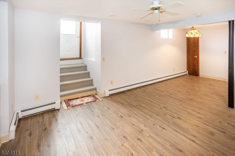 100 Troy Hills Road Whippany, NJ 07981 - Photo 29 of 37 wooden floor in an empty room with a window