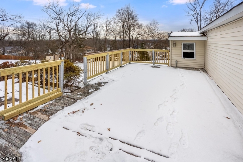 100 Troy Hills Road Whippany, NJ 07981 - Photo 34 of 37 a view of a terrace with chairs and wooden fence