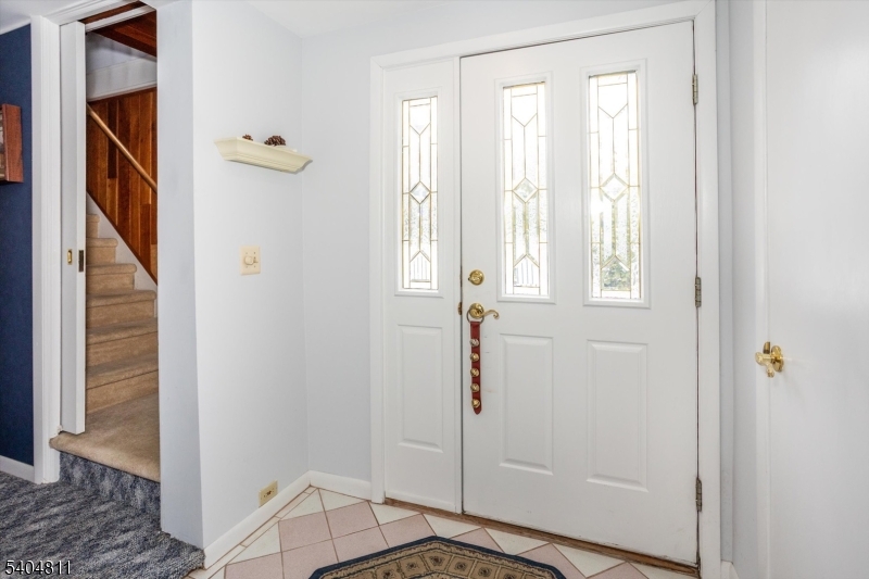 100 Troy Hills Road Whippany, NJ 07981 - Photo 6 of 37 a view of an entryway with wooden floor