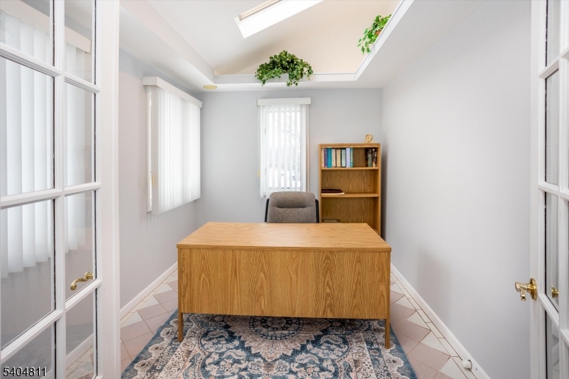 100 Troy Hills Road Whippany, NJ 07981 - Photo 7 of 37 a room with table and window