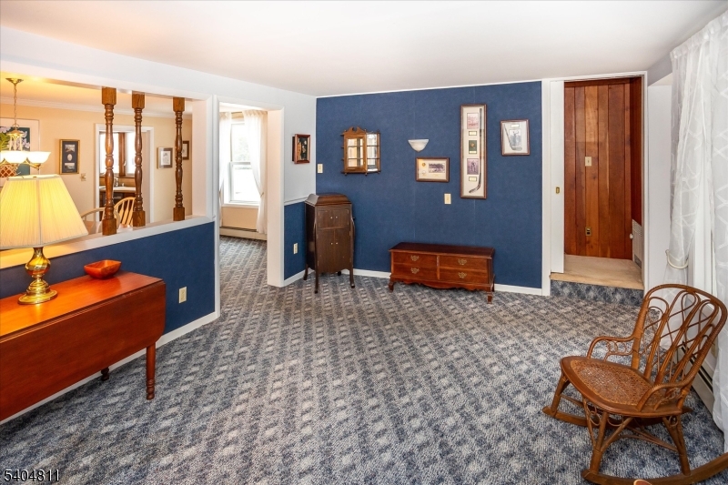 100 Troy Hills Road Whippany, NJ 07981 - Photo 9 of 37 a living room with furniture rug and a large window
