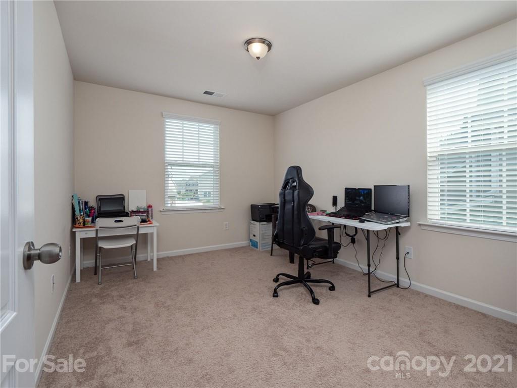 79157 Ridgehaven Road, Unit 154 Lancaster, SC 29720 - Photo 18 of 23 a view of a workspace with furniture and a window