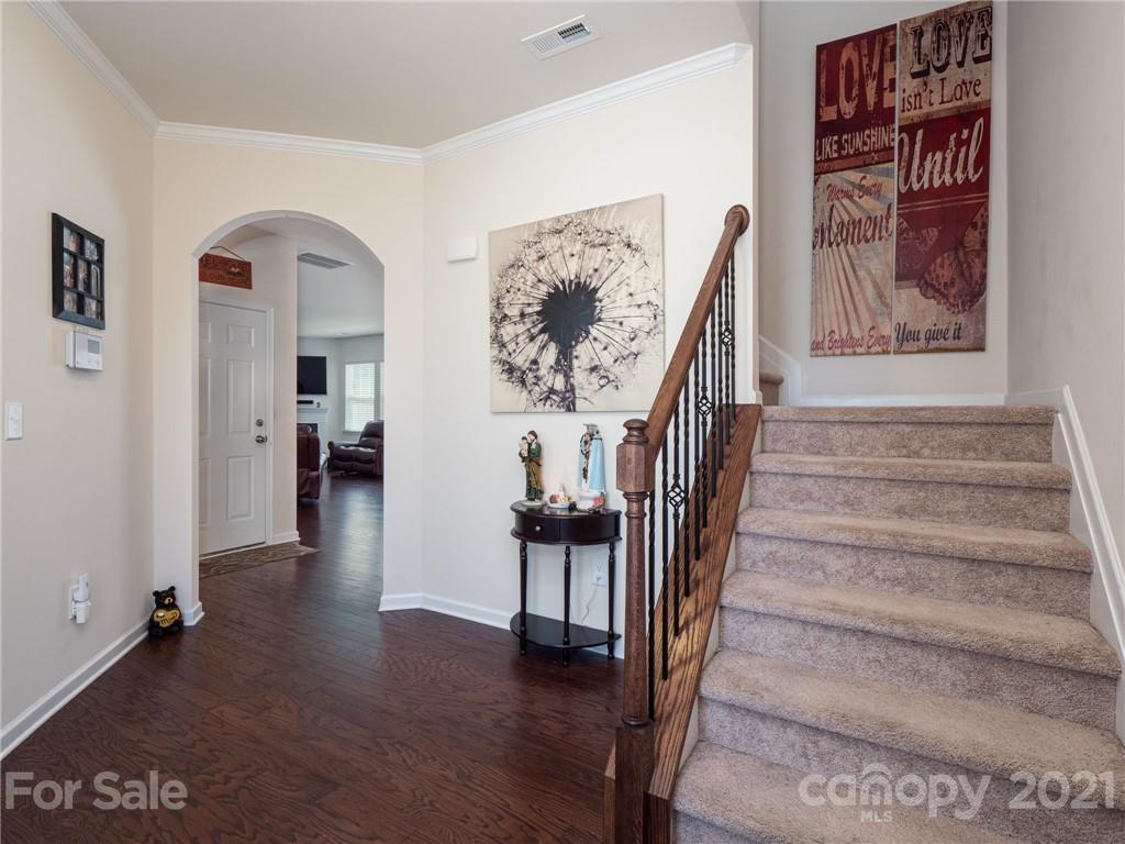 79157 Ridgehaven Road, Unit 154 Lancaster, SC 29720 - Photo 3 of 23 a view of entryway and hall with wooden floor