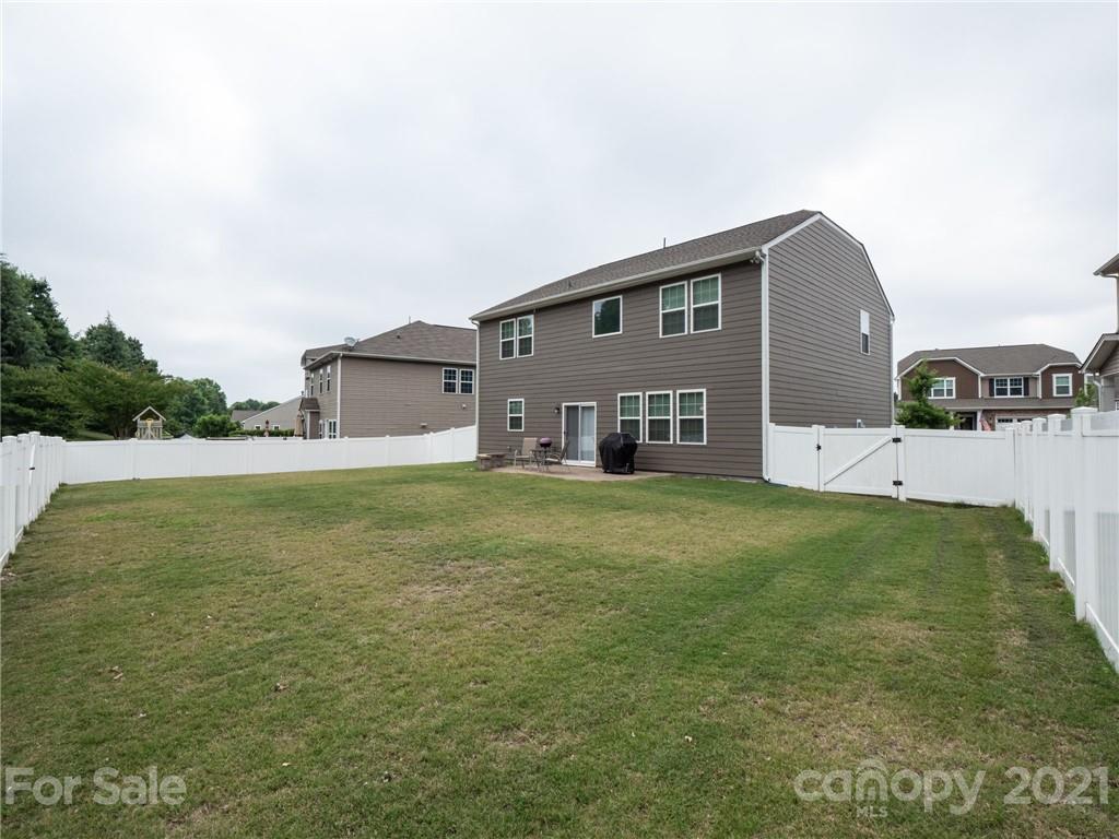 79157 Ridgehaven Road, Unit 154 Lancaster, SC 29720 - Photo 23 of 23 a front view of a house with a yard