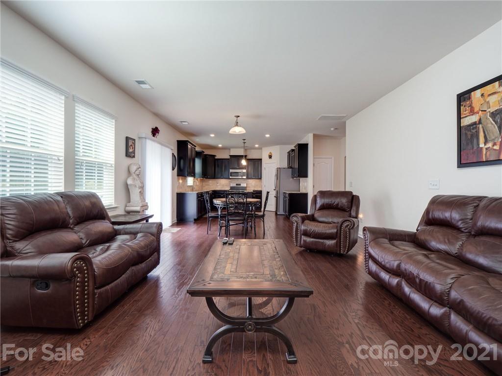 79157 Ridgehaven Road, Unit 154 Lancaster, SC 29720 - Photo 9 of 23 a living room with furniture and a large window