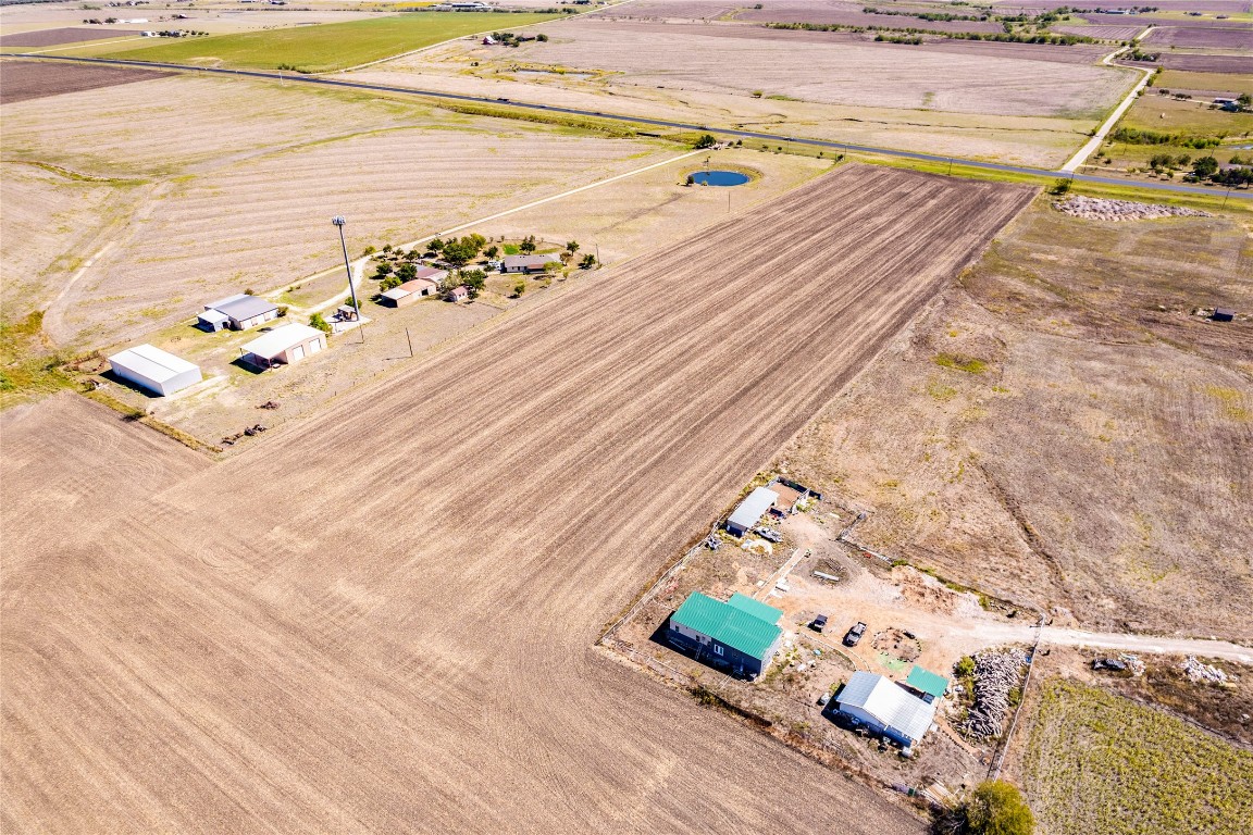 Tbd North Tbd N Fm Road, Unit 973 Coupland, TX 78615 - Photo 6 of 11 a picture of a room with wooden floor