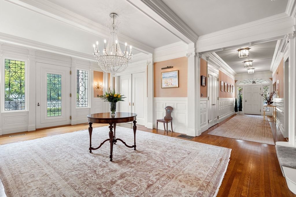 4 Cobb Avenue Manchester, MA 01944 - Photo 4 of 41 a living room with furniture and a chandelier