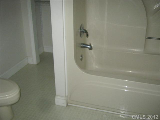 147 Laren Road Shelby, NC 28152 - Photo 8 of 16 a bathroom with a shower and toilet