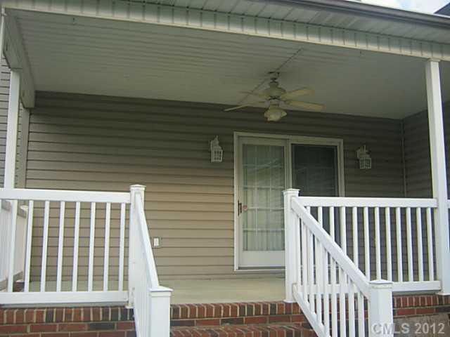 147 Laren Road Shelby, NC 28152 - Photo 10 of 16 a view of porch with a chair