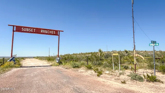a view of a road with an ocean view