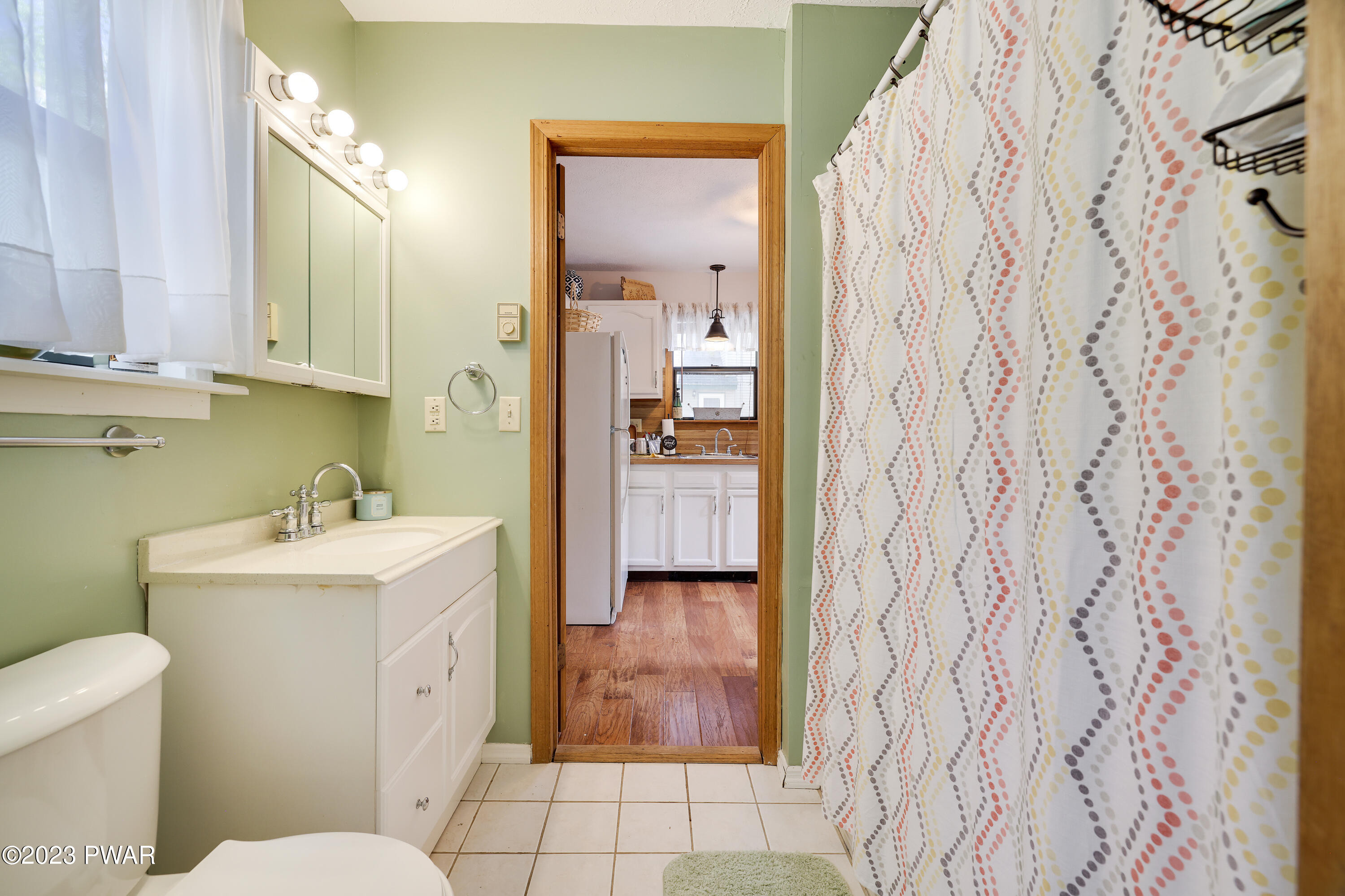 884 Goose Pond Road Lake Ariel, PA 18436 - Photo 14 of 39 a bathroom with a sink a toilet and shower
