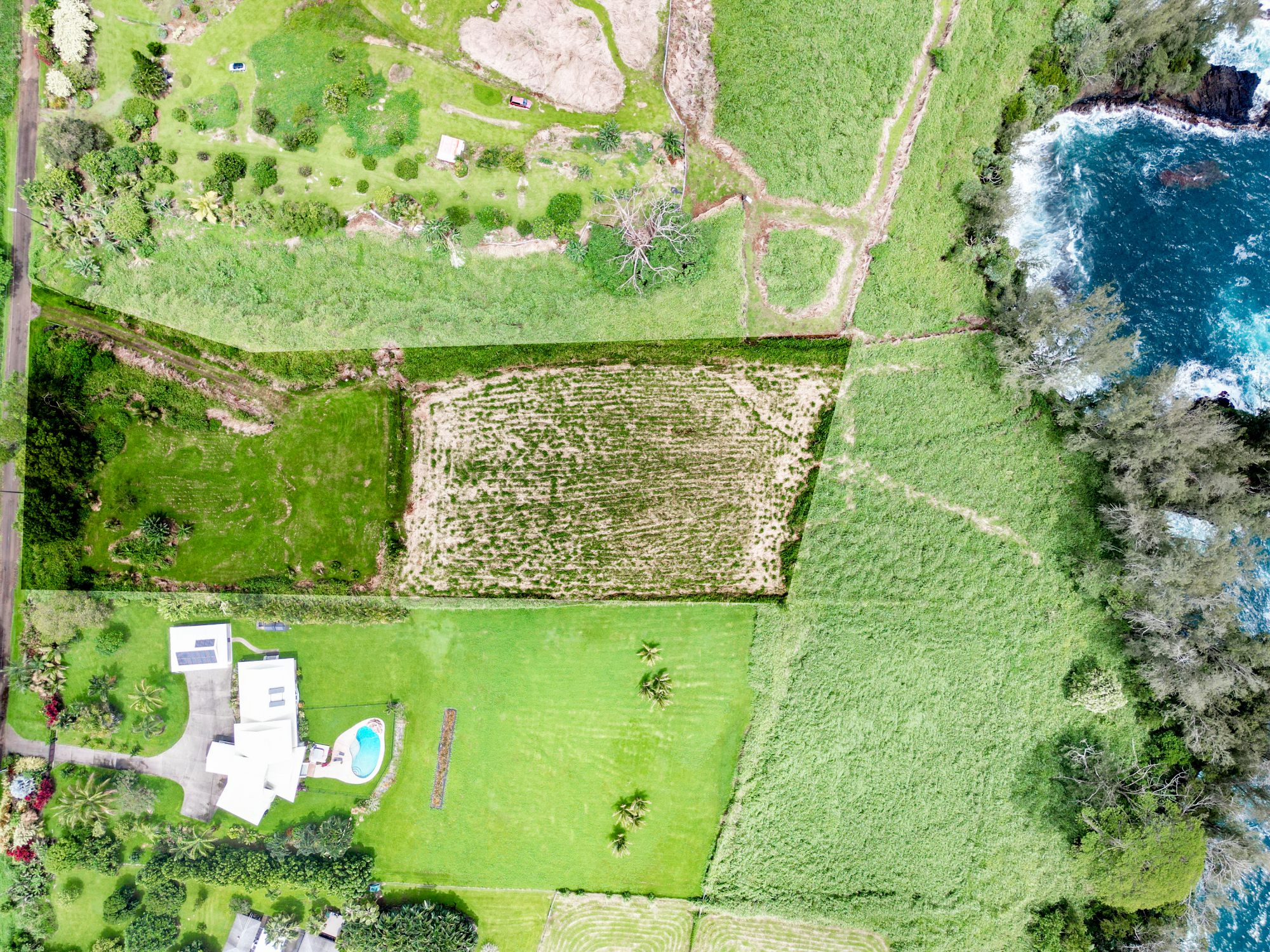 28-1168 Lot 73 Loa Road Pepeekeo, HI 96783 - Photo 3 of 28 a view of a lake from a yard