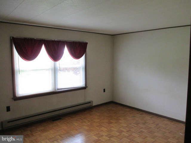 7301 Gunpowder Road Baltimore, MD 21220 - Photo 11 of 29 a view of an empty room with a window