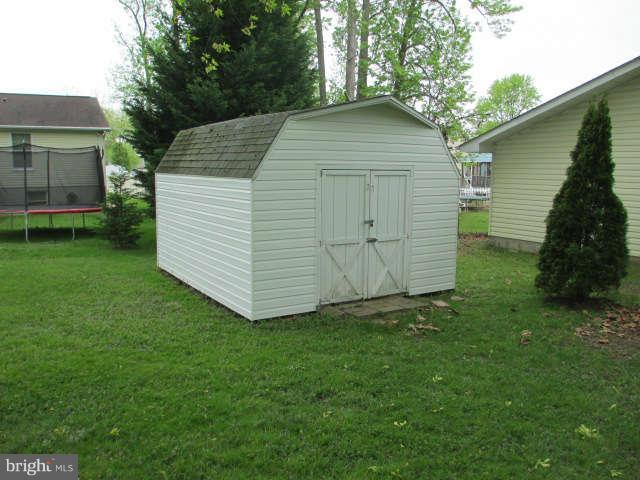 7301 Gunpowder Road Baltimore, MD 21220 - Photo 25 of 29 a view of a backyard of the house