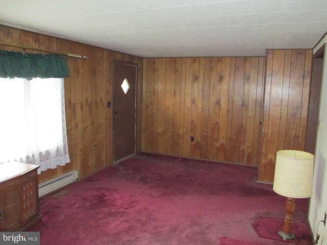 7301 Gunpowder Road Baltimore, MD 21220 - Photo 5 of 29 a view of an empty room and a window
