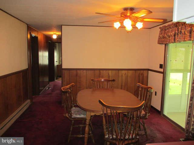 7301 Gunpowder Road Baltimore, MD 21220 - Photo 10 of 29 a view of a chairs and dinning table in patio
