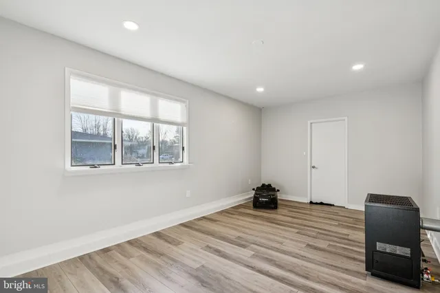 a room with a bed and a chair