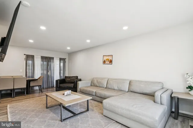 a living room with furniture and a couch