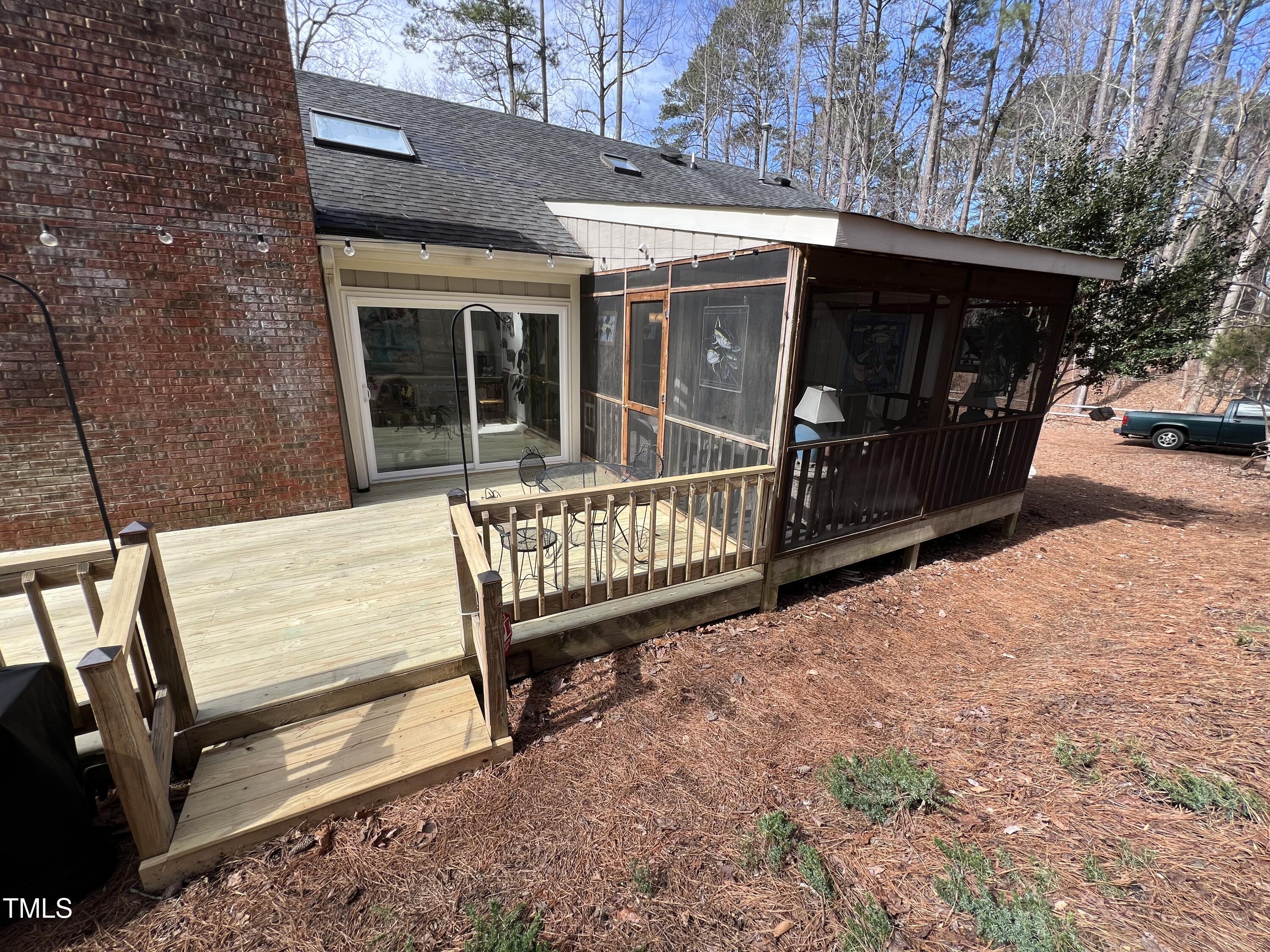 816 Oxgate Circle Raleigh, NC 27615 - Photo 24 of 40 a view of a chair and table in the patio
