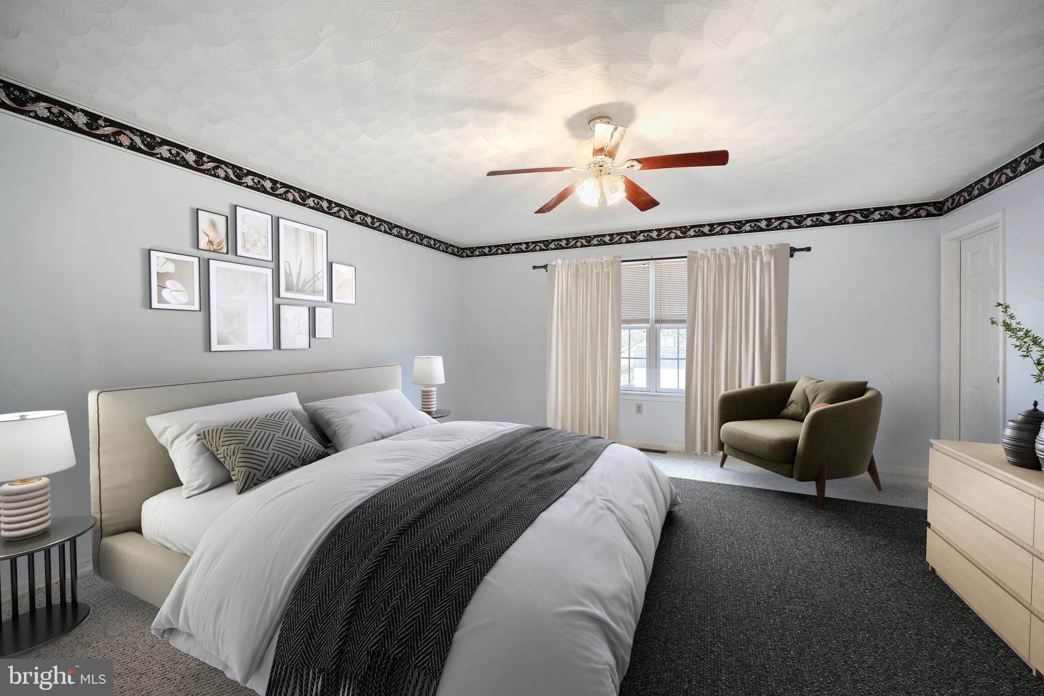 105 Wheaton Drive Littlestown, PA 17340 - Photo 13 of 39 a bedroom with furniture and a large window