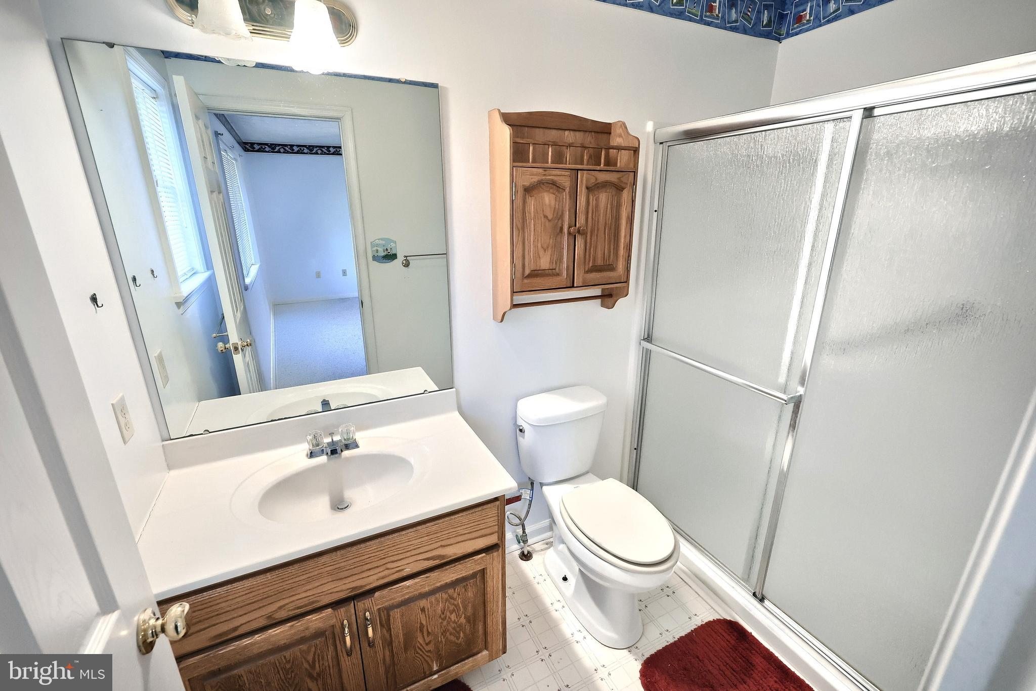 105 Wheaton Drive Littlestown, PA 17340 - Photo 14 of 39 a bathroom with a sink toilet and shower