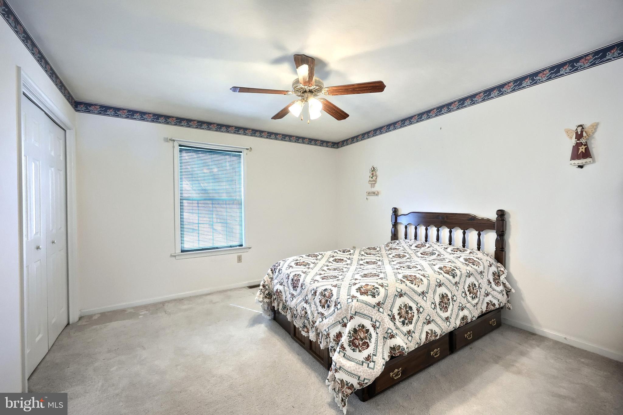 105 Wheaton Drive Littlestown, PA 17340 - Photo 16 of 39 a bedroom with a bed and a ceiling fan