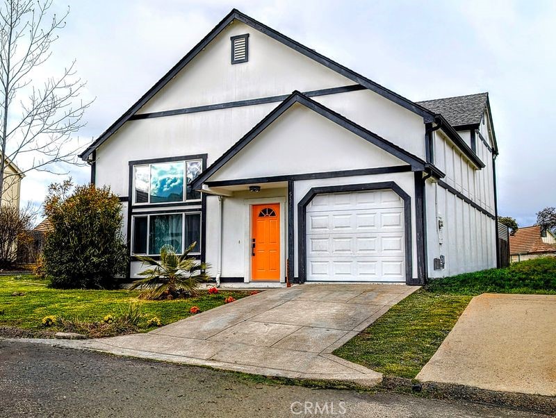 5377 Lancaster Road Lakeport, CA 95453 - Photo 1 of 20 a front view of a house with garden